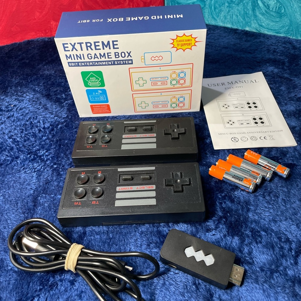 Extreme Mini Game Box, plug into TV and play. (Pre-owned) in great condition.
